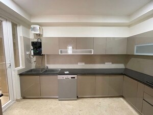 Kitchen in 3 BHK Apartment at Maya Green Lotus Utsav, International Airport Road – for Rent