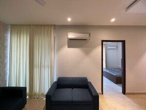 Living Room in 3 BHK Apartment at Maya Green Lotus Utsav, International Airport Road – for Rent