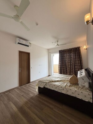 Bedroom in 3 BHK Apartment at Mahagun Moderne, Sector 78 – for Rent
