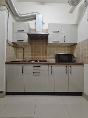 Kitchen in 2 BHK Apartment at Amrapali Princely Estate, Sector 76 – for Rent