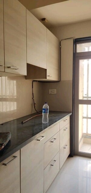 Kitchen in 2 BHK Apartment at Lodha Luxuria Priva, Majiwada – for Rent