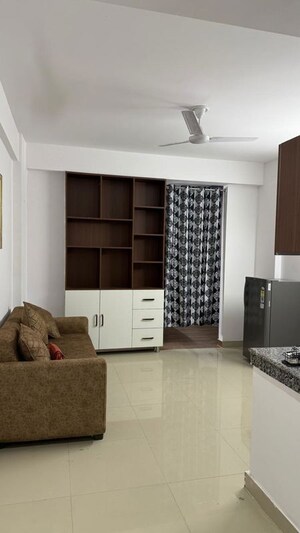 Living Room in 1 BHK Apartment at GTM The Capital, Aman Vihar – for Rent