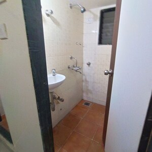 Bathroom in 1 BHK Apartment at JP Decks, Goregaon East – for Rent
