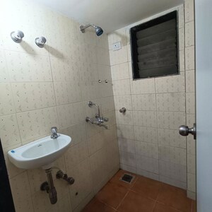 Bathroom in 1 BHK Apartment at JP Decks, Goregaon East – for Rent