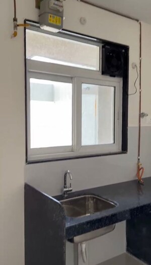 Bathroom in 2 BHK Apartment at Ashar Axis, Majiwada – for Sale