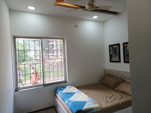 Bedroom in 2 BHK Apartment at Aksha Vrundavan, Chikhali – for Rent