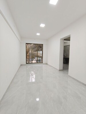 Living Room in 1 BHK Apartment at Magic Meera Heights, Mira Road – for Sale