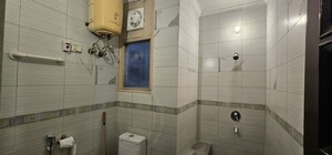Bathroom in 3 BHK Apartment at Chittaranjan Park – for Rent