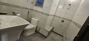 Bathroom in 3 BHK Apartment at Chittaranjan Park – for Rent