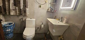 Bathroom in 3 BHK Apartment at Chittaranjan Park – for Rent