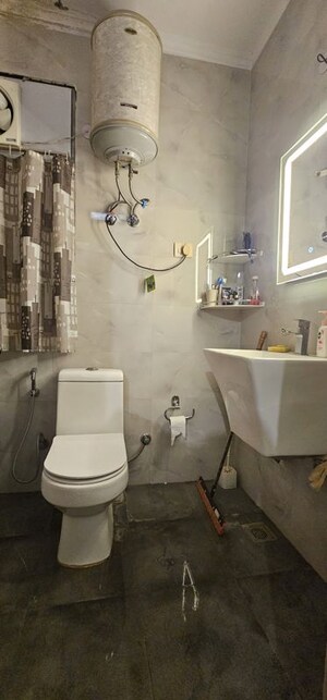 Bathroom in 3 BHK Apartment at Chittaranjan Park – for Rent