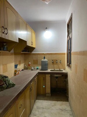 Kitchen in 2 BHK Apartment at Amrapali Heartbeat City, Sector 107 – for Rent