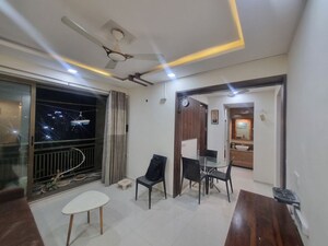 Living Room in 1.5 BHK Apartment at Vaishnodevi Circle – for Rent