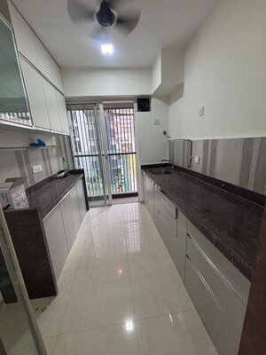 Kitchen in 2 BHK Apartment at Courtyard by Narang Realty and The Wadhwa Group, Pokhran Road No Two – for Rent