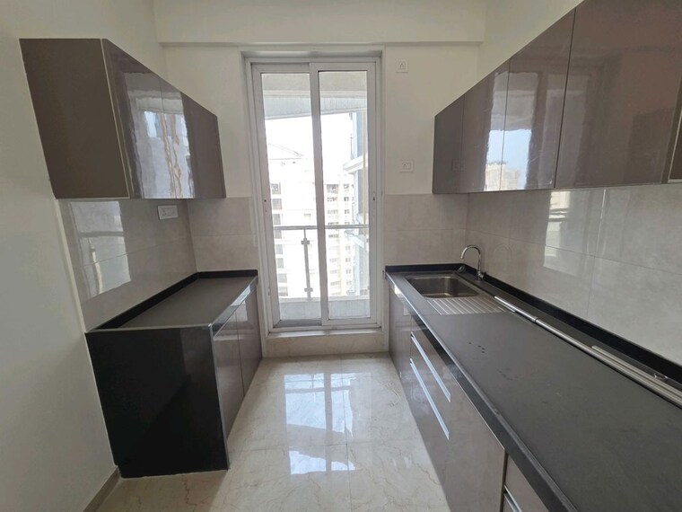 Kitchen, rosa-manhattan 3 Bedroom 965 Sq.Ft. Apartment In Ghodbunder Road Thane 10200238