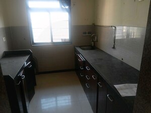 Kitchen in 3 BHK Apartment at Acme Ozone, Manpada – for Rent