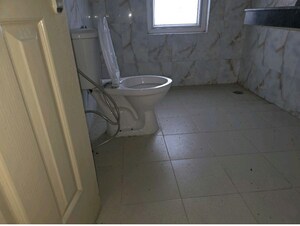 Bathroom in 3 BHK Apartment at Emaar Palm Gardens, Sector 83 – for Sale