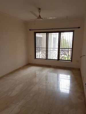 Living Room in 2 BHK Apartment at Whispering Heights, Malad West – for Sale