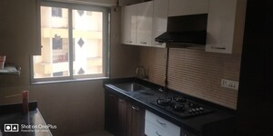Kitchen in 2 BHK Apartment at Romell Diva, Malad West – for Sale
