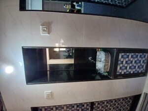 Kitchen in 1 BHK Apartment at Chanchal Kalyan Complex, Yari Road – for Rent