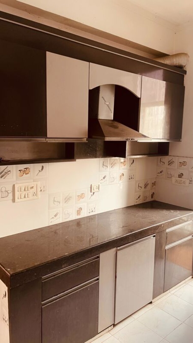 Kitchen, rishita-mulberry-heights 3.5 Bedroom 1965 Sq.Ft. Apartment In Sushant Golf City Lucknow 10200399