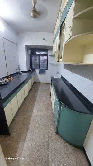 Kitchen in 2 BHK Apartment at Arpan Darpan CHS, Goregaon East – for Rent