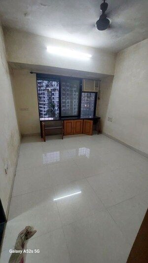 Room in 2 BHK Apartment at Arpan Darpan CHS, Goregaon East – for Rent