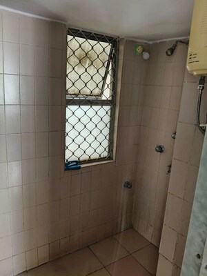 Bathroom in 1 BHK Apartment at Lokpuram CHS, Vasant Vihar – for Rent