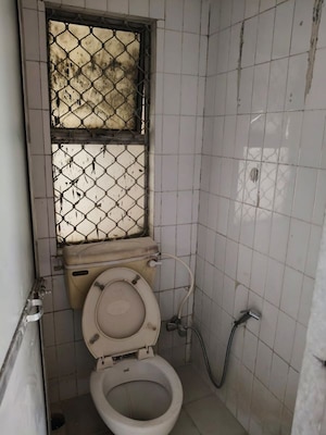 Bathroom in 1 BHK Apartment at Lokpuram CHS, Vasant Vihar – for Rent