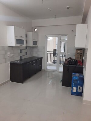 Kitchen in 2 BHK Apartment at ABA Cherry County, Tech Zone 4 Greater Noida – for Rent
