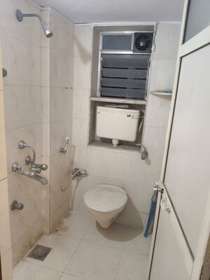 Bathroom in 1 BHK Apartment at Lok Upvan Apartment Phase 2, Vasant Vihar – for Sale