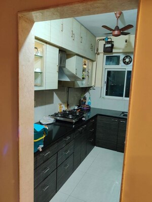 Kitchen in 2 BHK Apartment at Casa Marina CHS LTD, Ghodbunder Road – for Sale