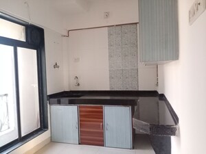 Kitchen in 2 BHK Apartment at Miracle Heights, Kopar Khairane – for Sale