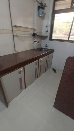 Kitchen in 1 BHK Apartment at Charkop Dhanashree CHS Ltd, Kandivali West – for Sale