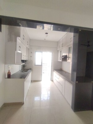 Kitchen in 3 BHK Apartment at Gulshan Bellina, Sector 16 Greater Noida – for Rent