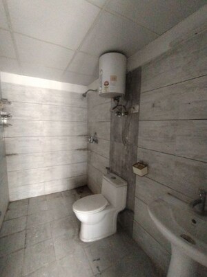 Bathroom in 3 BHK Apartment at Gulshan Bellina, Sector 16 Greater Noida – for Rent