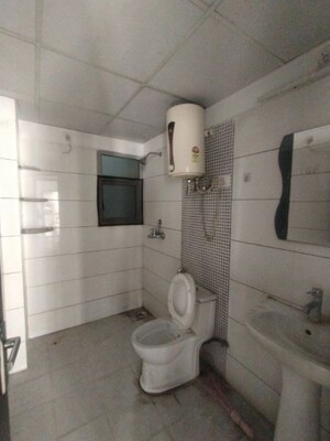 Bathroom in 3 BHK Apartment at Gulshan Bellina, Sector 16 Greater Noida – for Rent