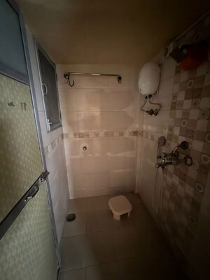 Bathroom in 1 BHK Apartment at Om Shiv Apartment, Manorama Nagar – for Rent