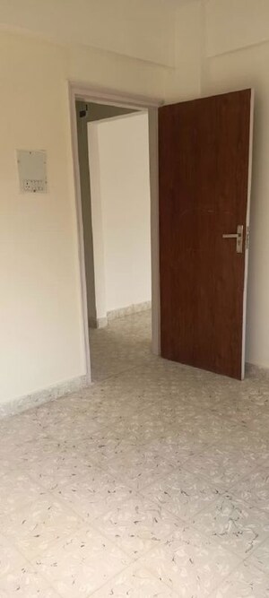 Room in 1 BHK Apartment at Brijdham Nanddham CHS, Goregaon West – for Rent