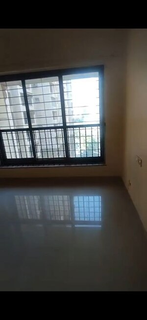 Living Room in 2 BHK Apartment at K Raheja Palm Court, Malad West – for Rent