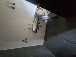 Bathroom in 3 BHK Apartment at Mahagun Moderne, Sector 78 – for Rent