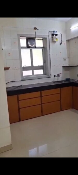 Kitchen in 1 BHK Apartment at Hanuman Ramanand CHS, Vile Parle East – for Rent