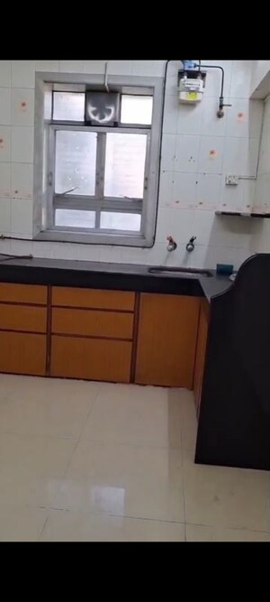 Kitchen in 1 BHK Apartment at Hanuman Ramanand CHS, Vile Parle East – for Rent