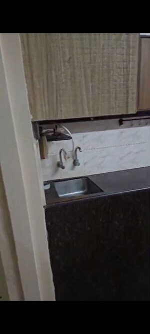 Bathroom in 1 BHK Apartment at Vile Parle West – for Rent