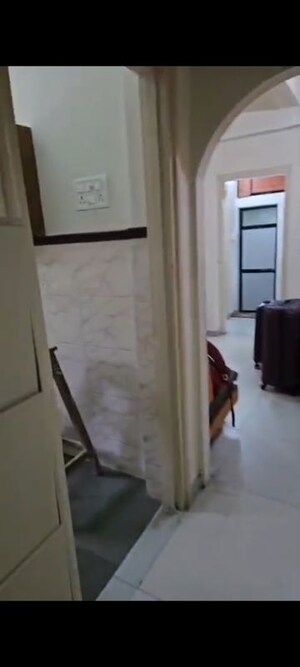Staircase in 1 BHK Apartment at Vile Parle West – for Rent