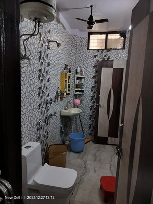 Bathroom in 3 BHK Builder Floor at Dashrath Puri – for Sale