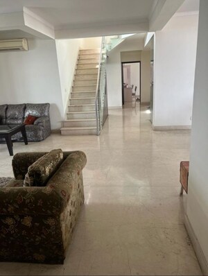 Living Room in 4 BHK Apartment at The Citizen Apartments, Sector 51 – for Rent