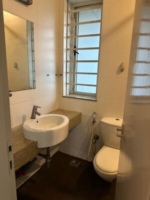 Bathroom in 2 BHK Apartment at Sheth Vasant Lawns, Laxmi Nagar – for Rent