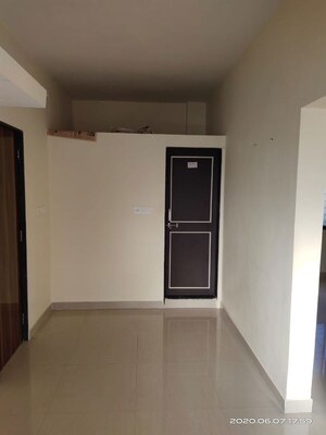 Building Lobby in 1 BHK Apartment at Wadgaon Sheri – for Rent