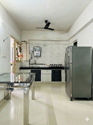 Kitchen in 2 BHK Apartment at Sargasan – for Sale